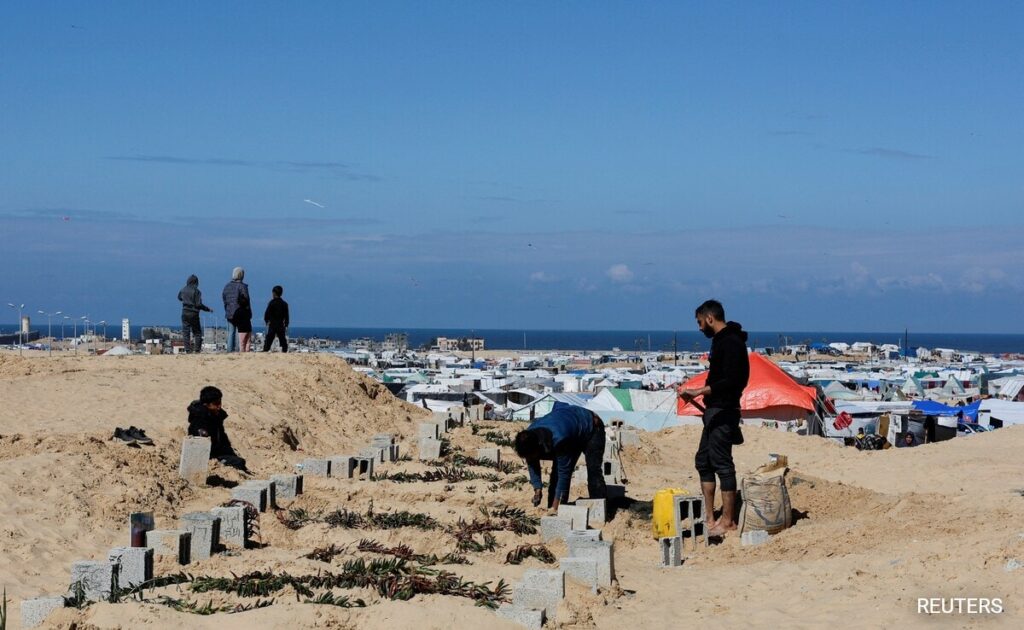 Displaced Gazans Seek Shelter In Cemetery