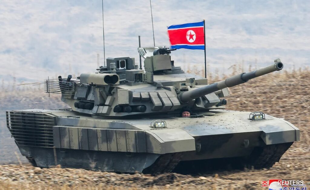 Kim Jong Un In Leather Jacket Drives North Korea New Tank In Mock Battle